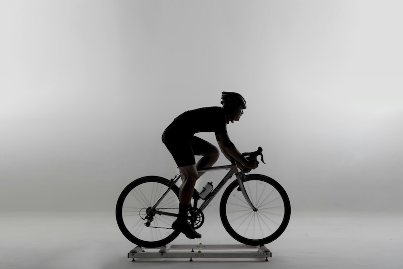 Professionele bike fitting voor triathlon optimaliseert fietspositie voor sneller en comfortabeler fietsen tijdens wedstrijden.